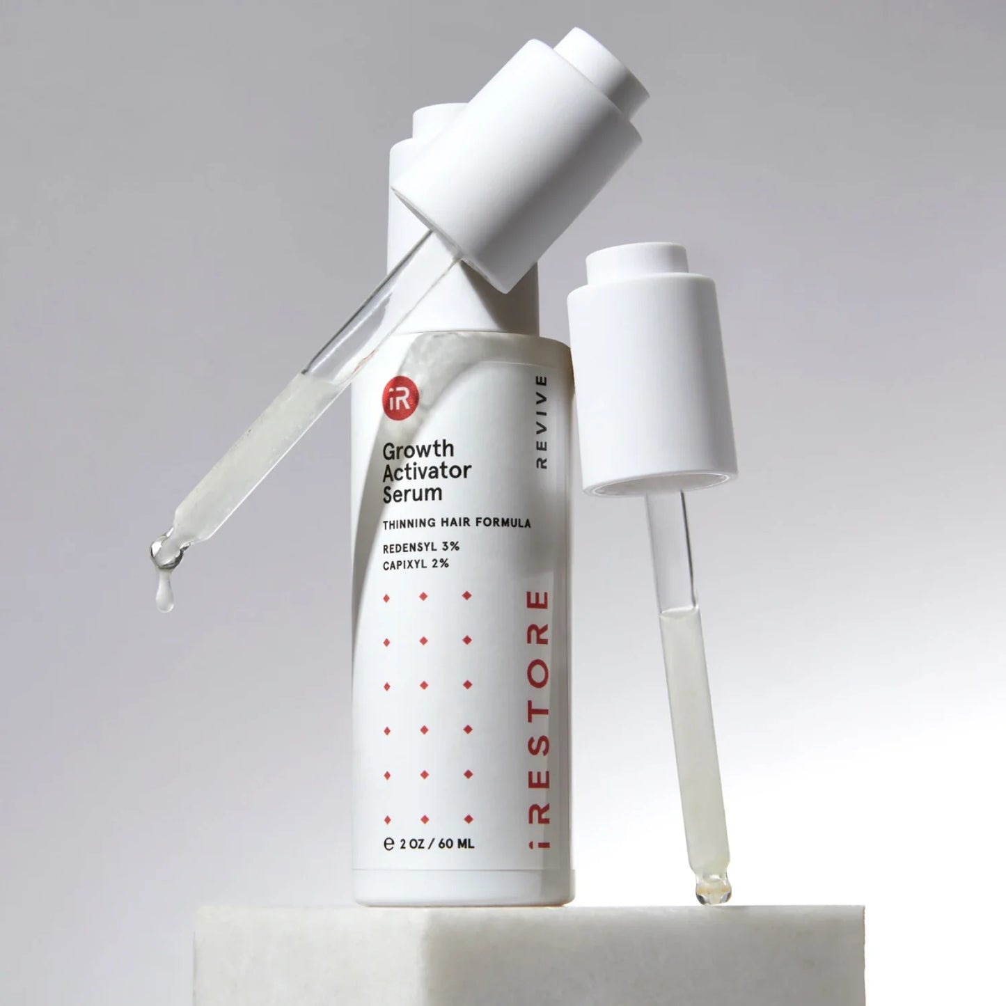 Growth activator serum with two droppers