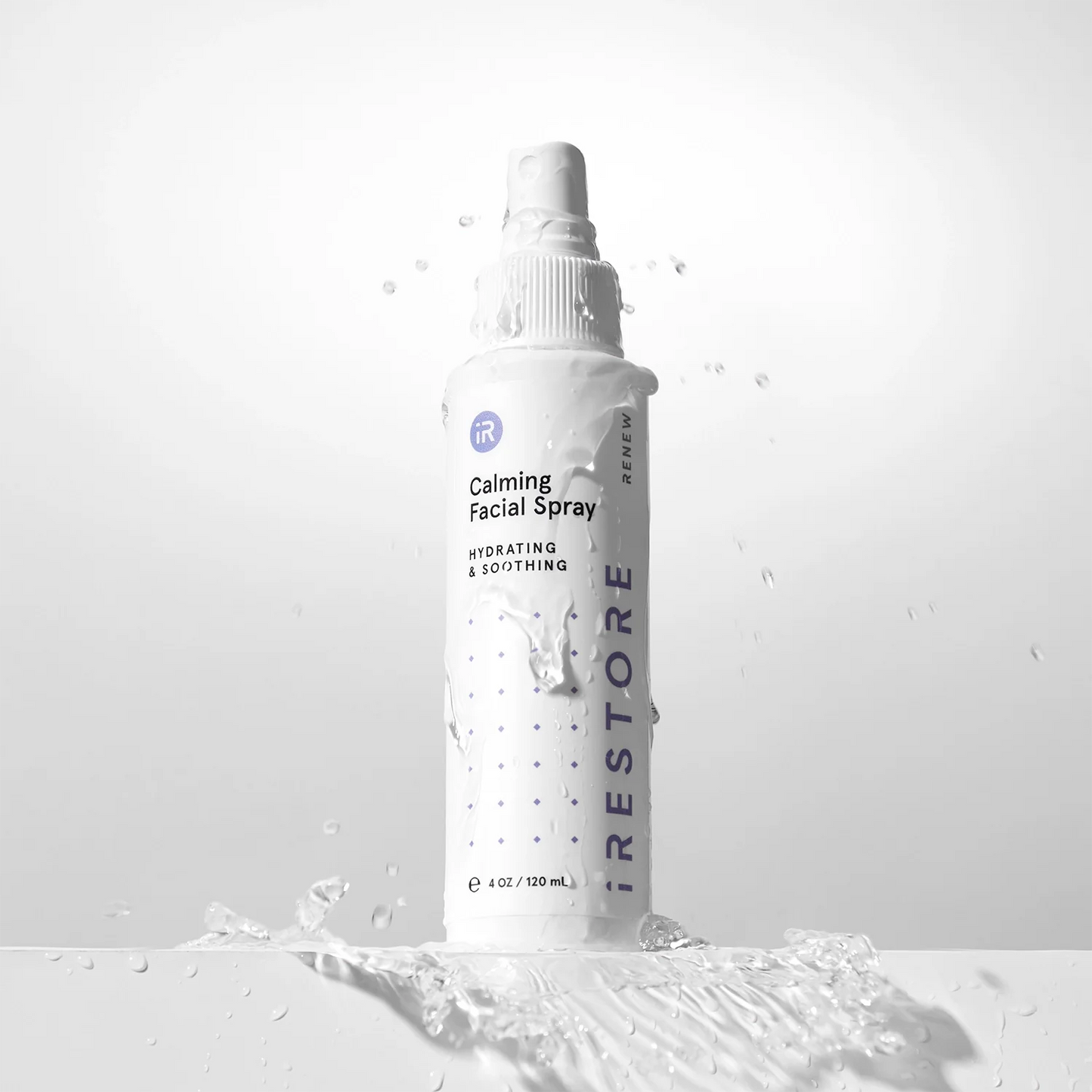 Calming facial spray dripping with water