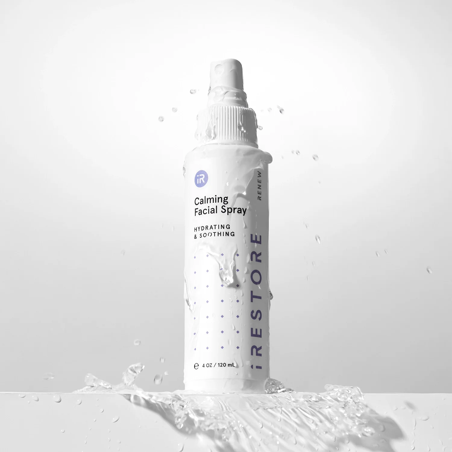 Calming facial spray dripping with water