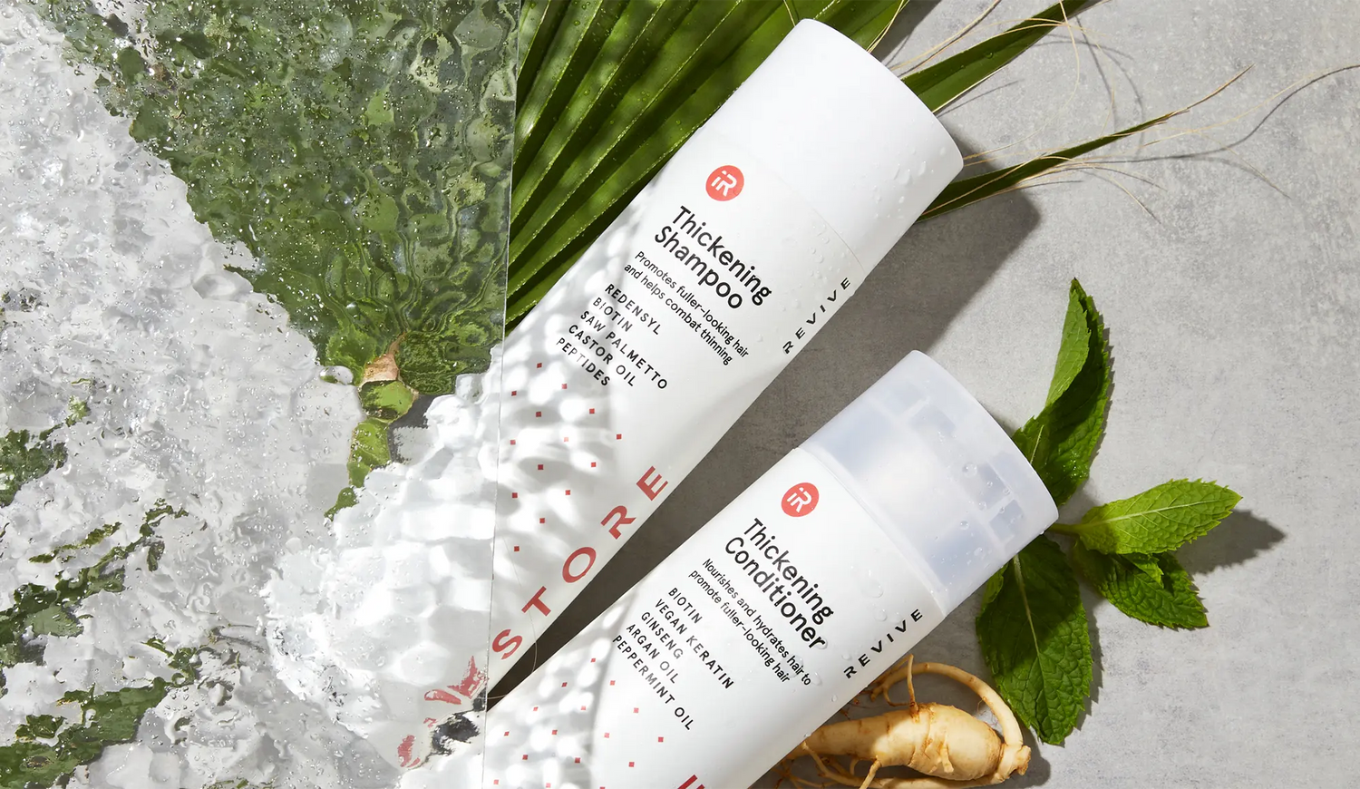 thickening shampoo and thickening conditioner against concrete background